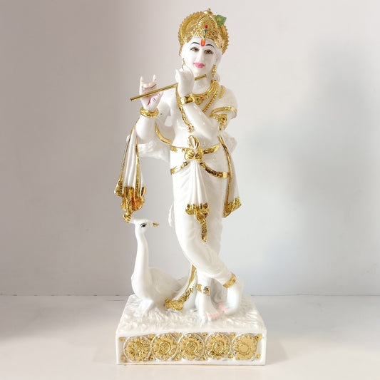 Krishna with peacock idol