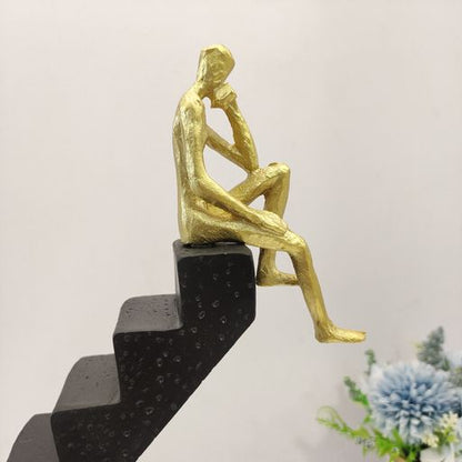 Modern Home decor Abstract design Thinker sitting on staircasae