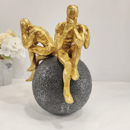 Wise man sitting on sphere Showpiece for home decoration