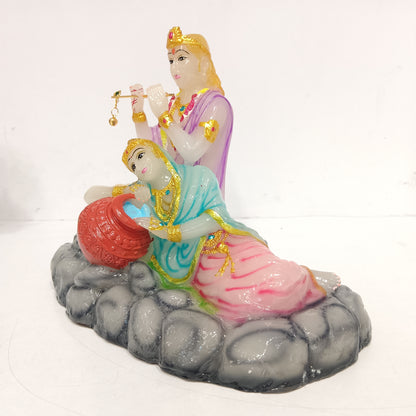 Radha Krishna setting on stones idol