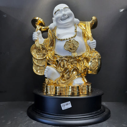 Gold and white laughing Buddha