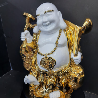 Gold and white laughing Buddha