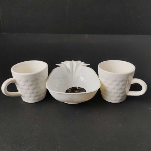 creramic cups with pine shaped serving tray