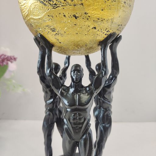 Three Strongan holding sphere Showpiece