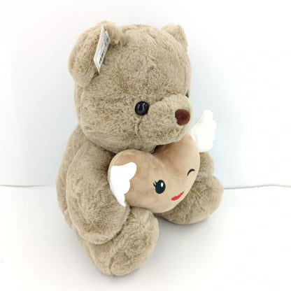 Brown teddy bear soft toy