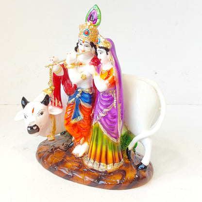 Cow with Radha Krishna Statue