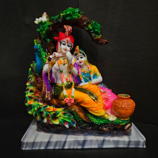 Lord krishna with radha lying under a tree playing flute peacock idol for Home Decor