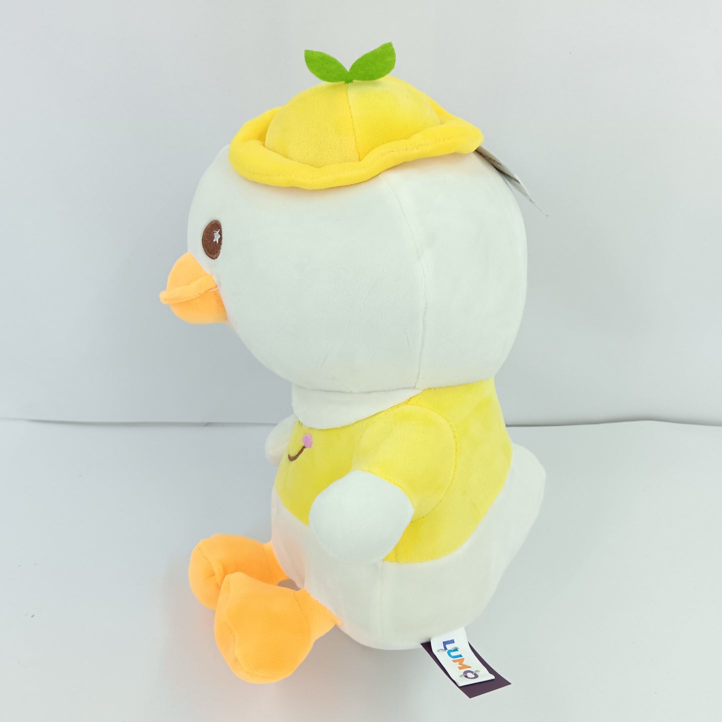 Cute duck in smiley face uniform soft toy