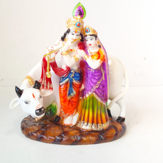 Cow with Radha Krishna Statue