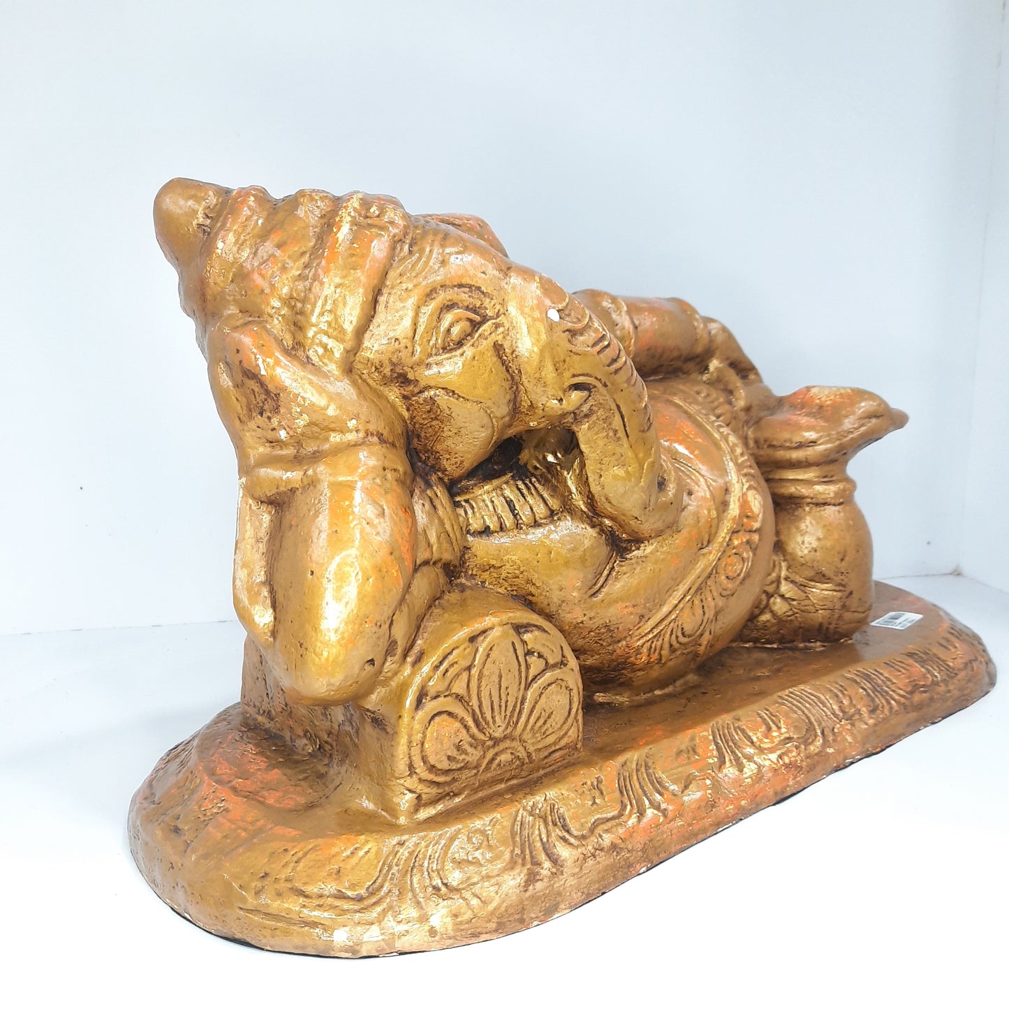 Paper Mache Ganesh Resting in Golden Orange Finish idol