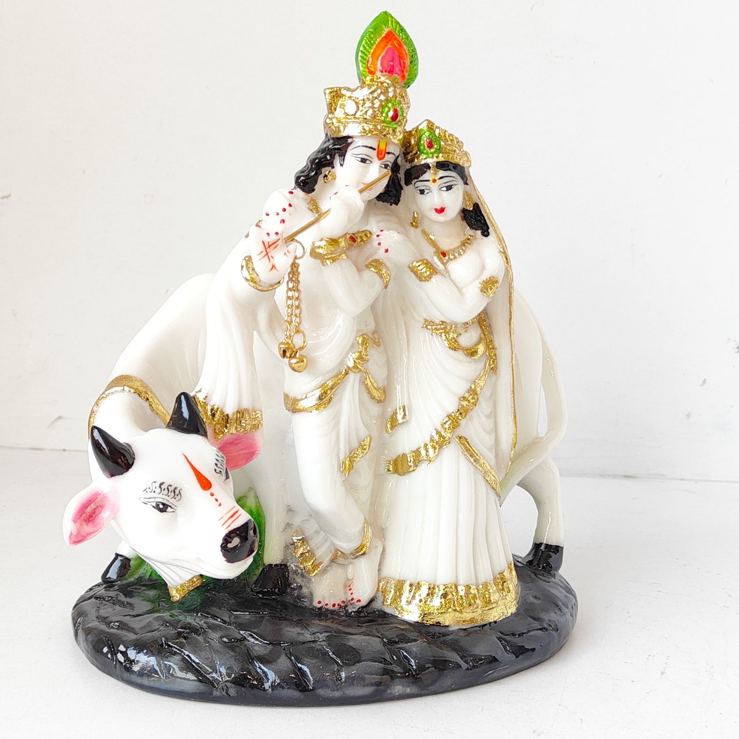 Cow with Radha Krishna Statue