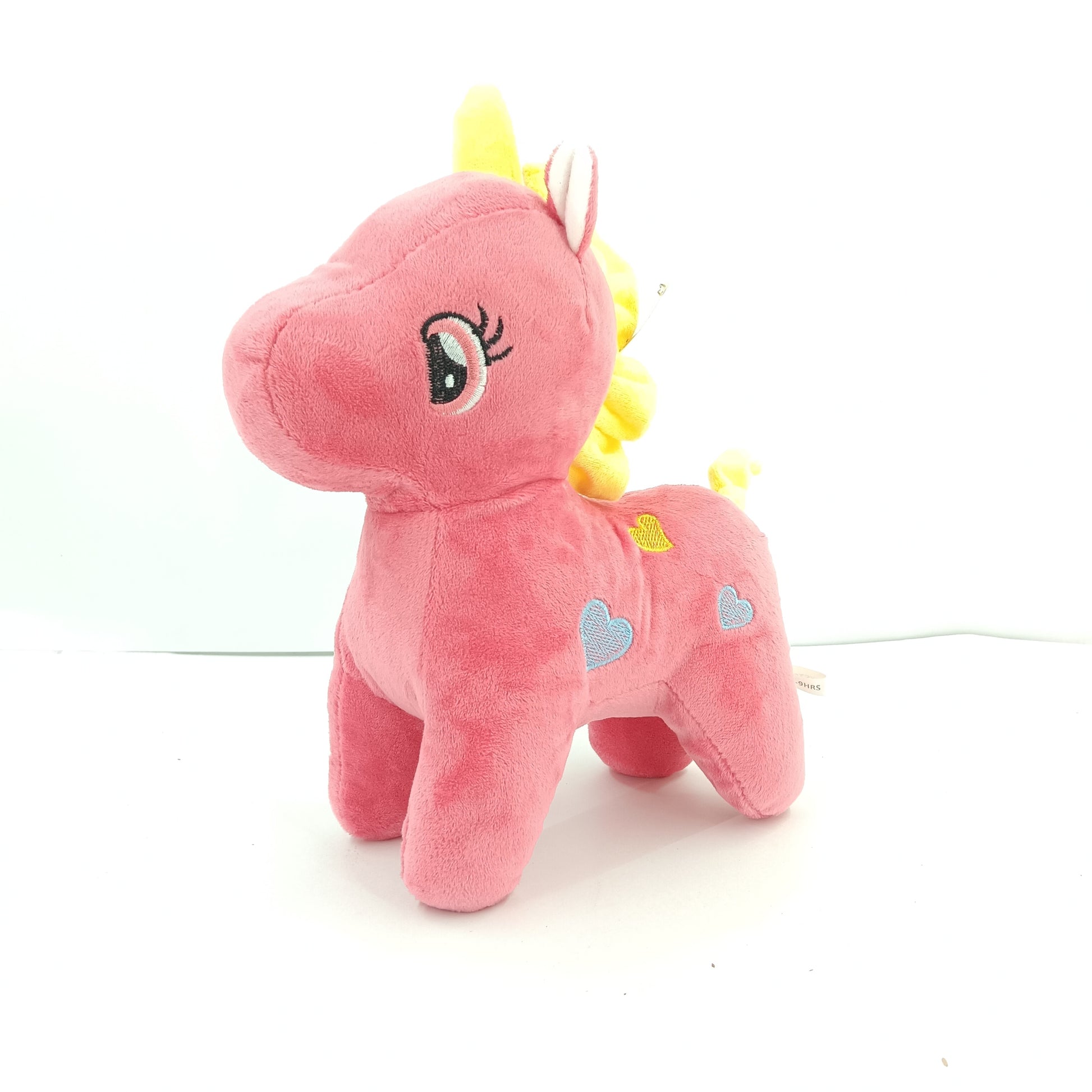 Colourful unicorn soft toy