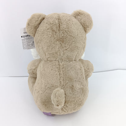 Brown teddy bear soft toy