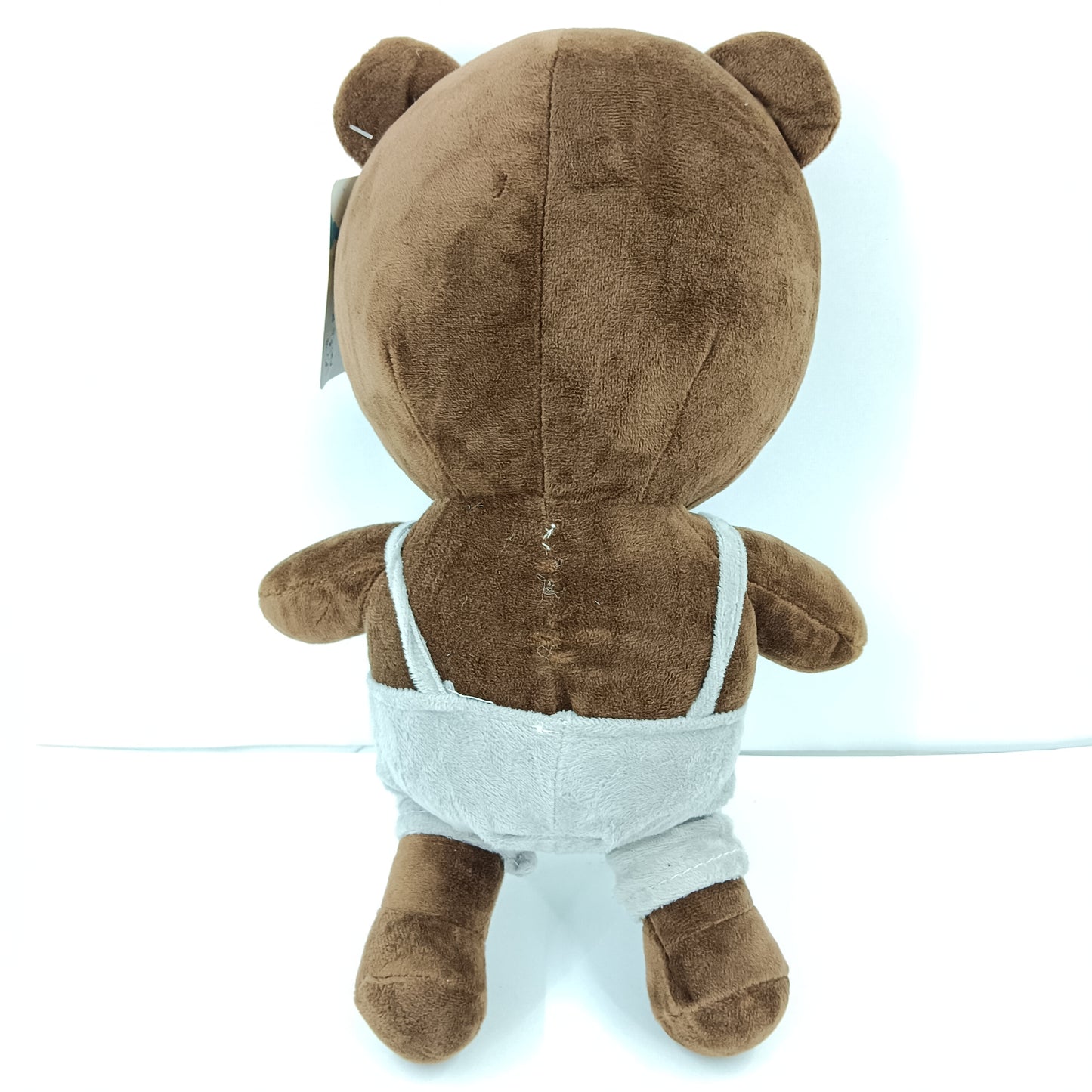 Brown teddy bear soft toy