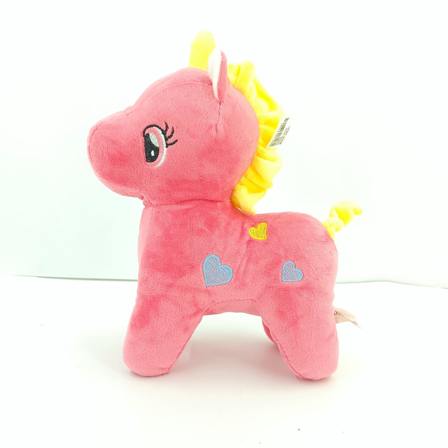 Colourful unicorn soft toy