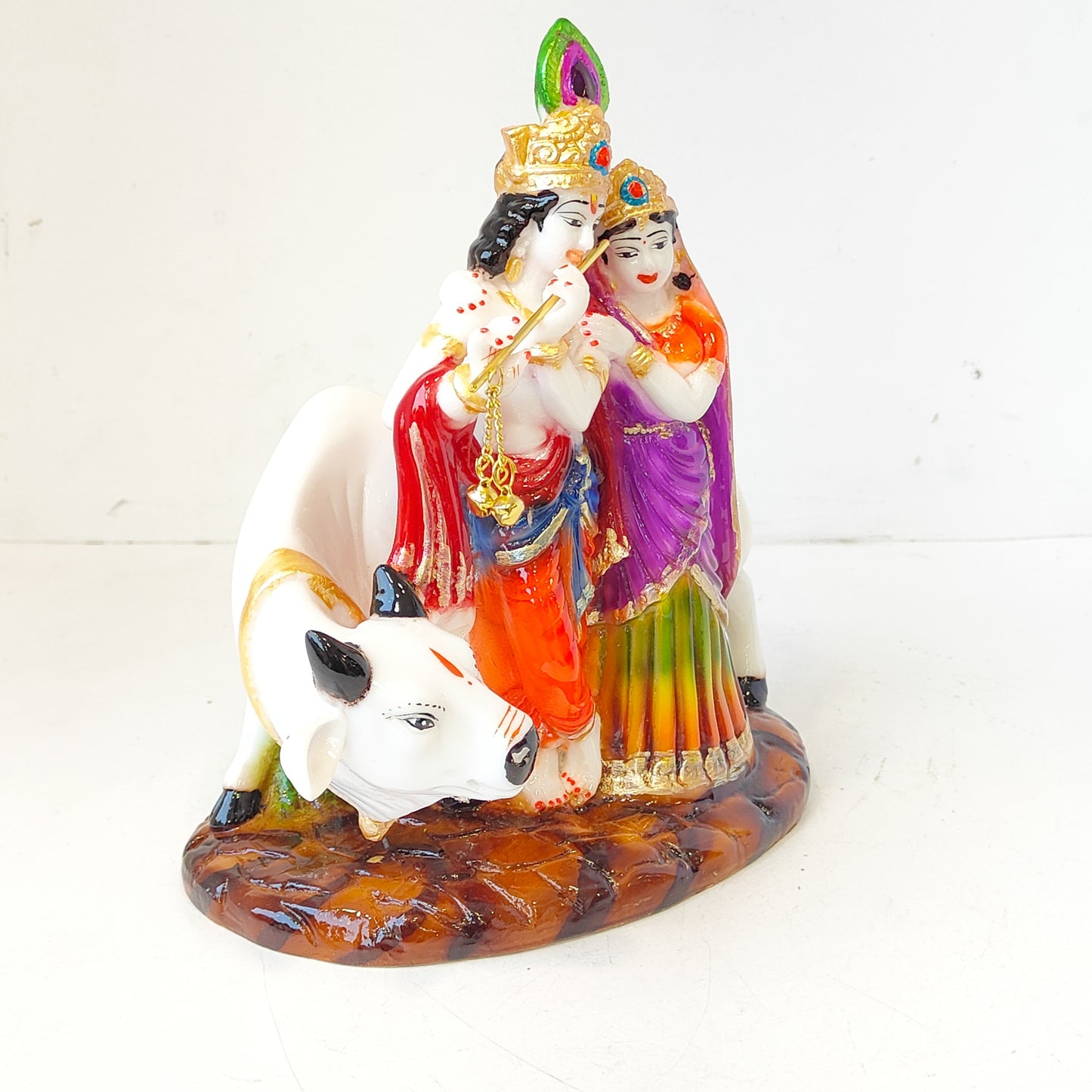 Cow with Radha Krishna Statue