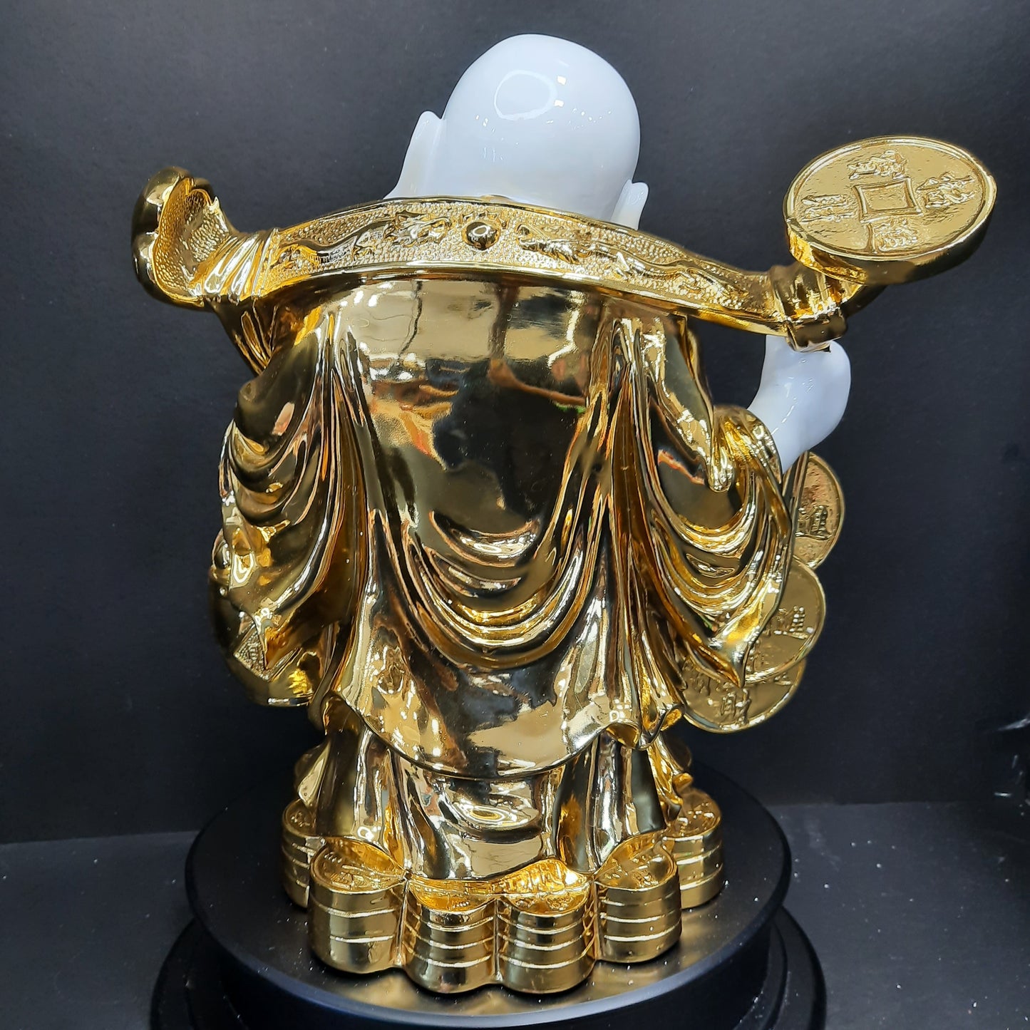 Gold and white laughing Buddha