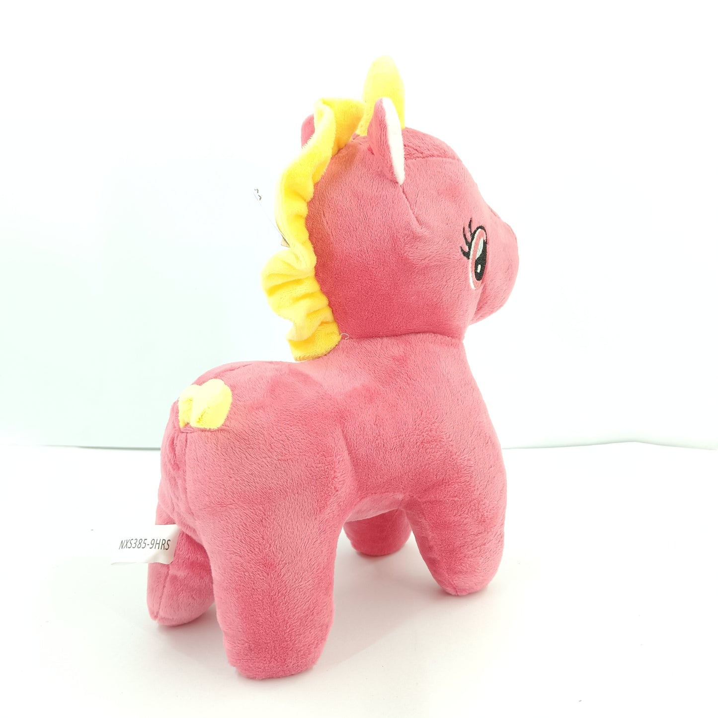 Colourful unicorn soft toy