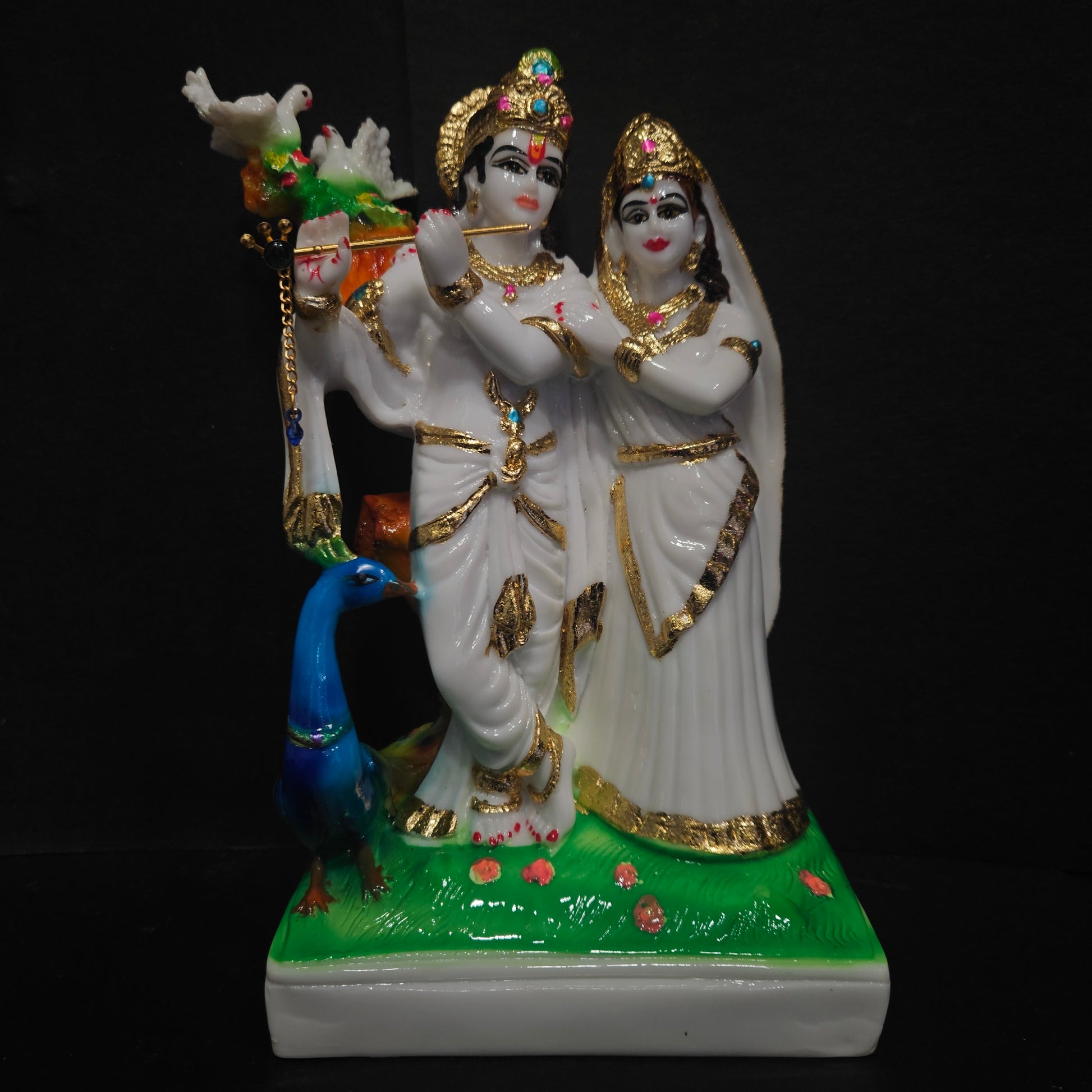 Lord Krishna with radha gold and white colour combo playing flute with peacock Idol for home pooja