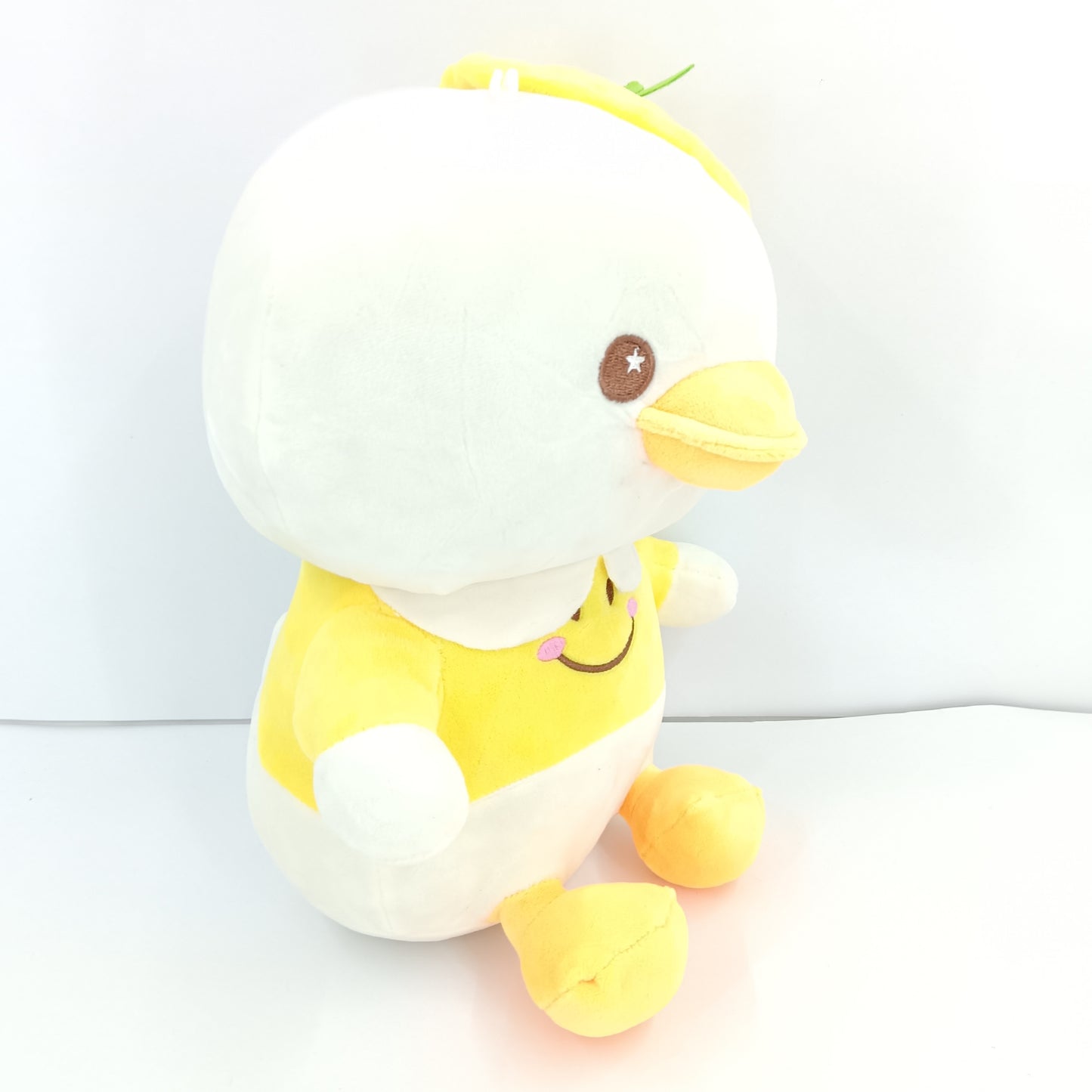 Cute duck in smiley face uniform soft toy