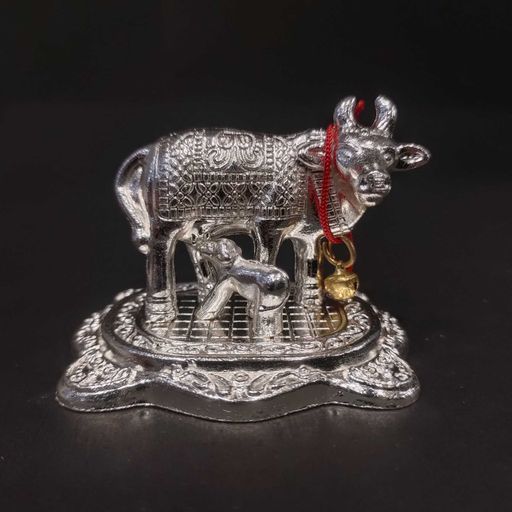 silver coated kamadhenu cow with calf statue